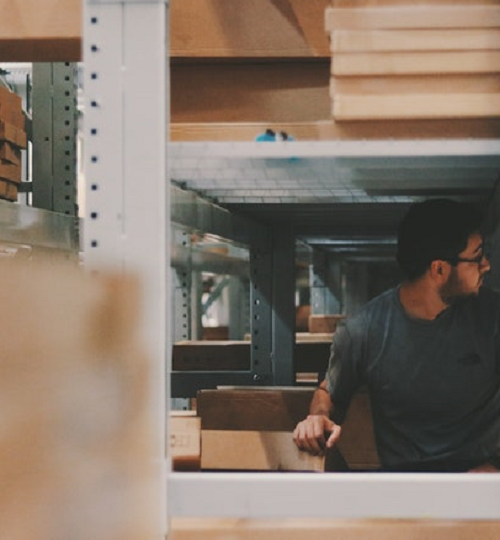 man-under shelves